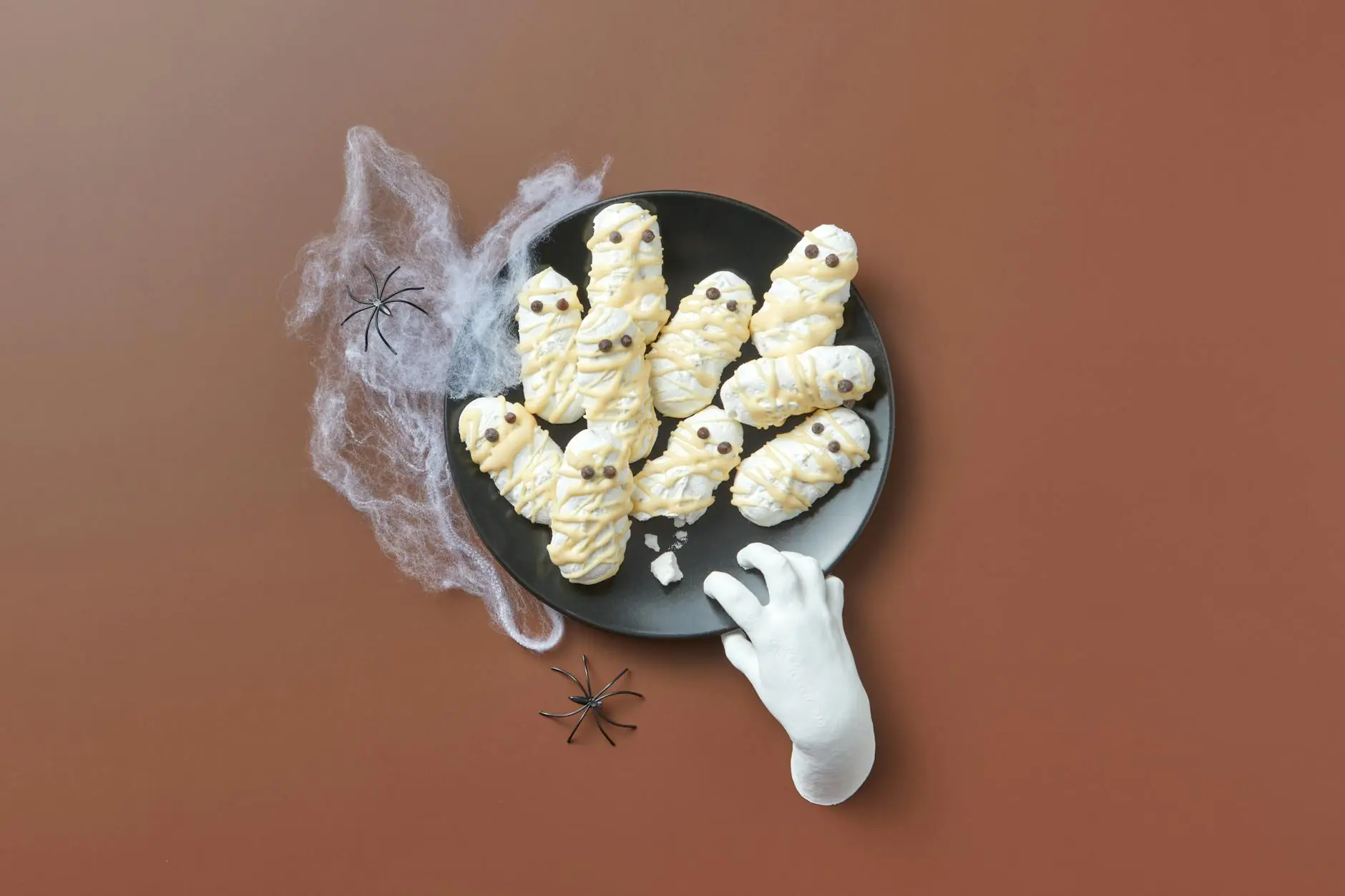 white sweet cookies on a plate with decoration
