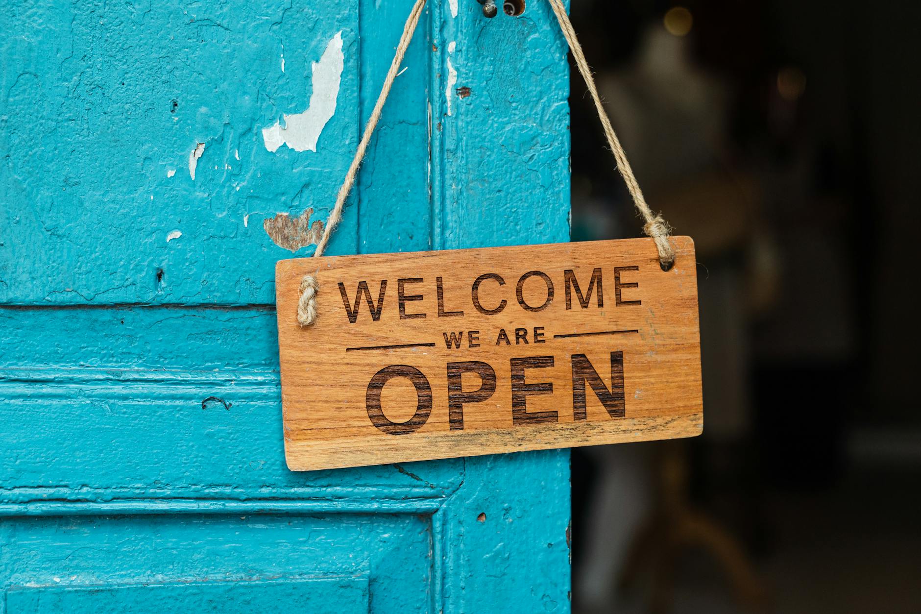 wooden welcome signage