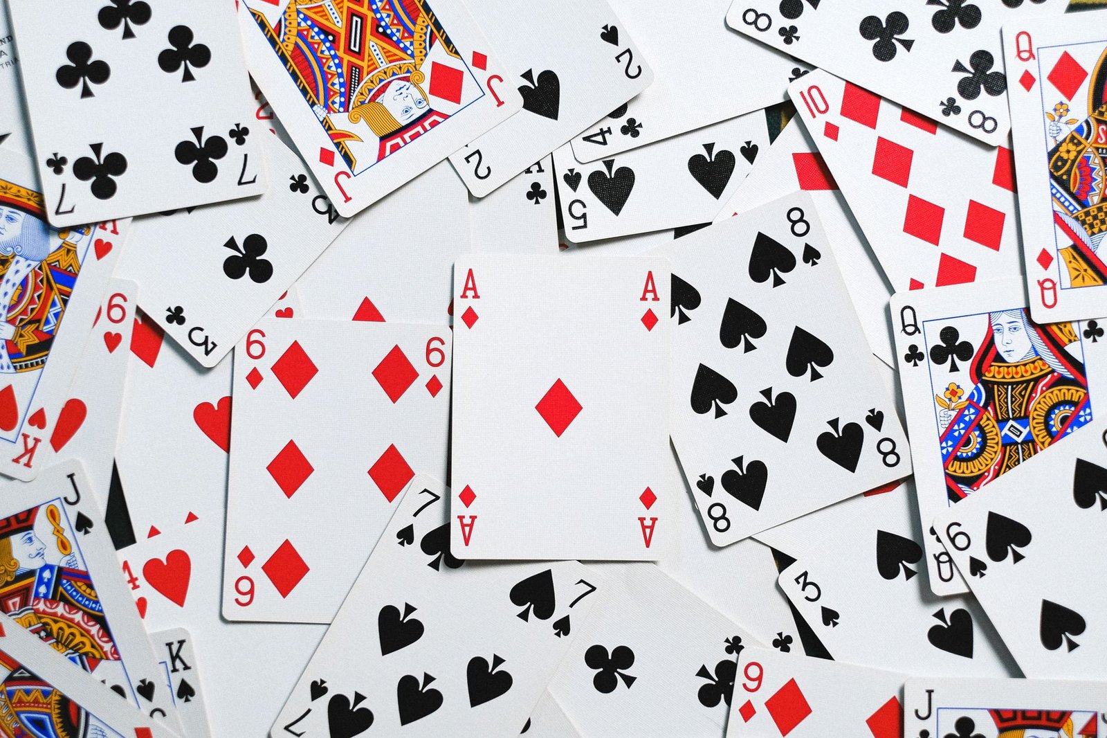 photo of scattered playing cards
